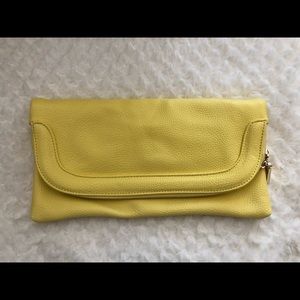 Charming Charlie yellow clutch and crossbody in one
